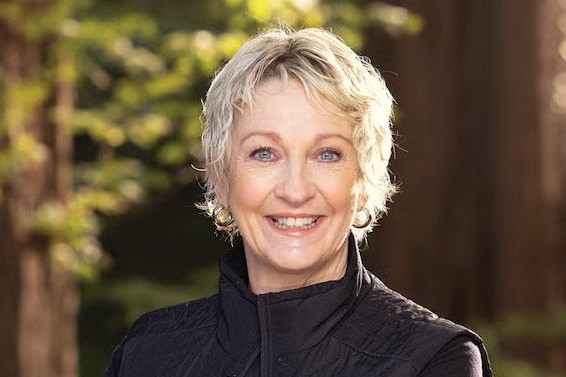 Headshot of Jill Tiefenthaler, a white women with short blonde hair.