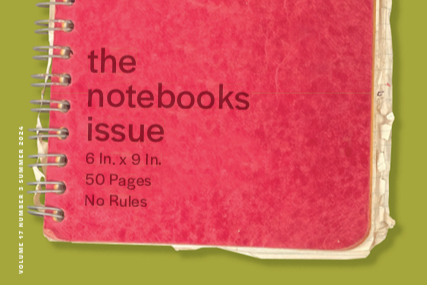 The cover of FIT's HUE: The Notebooks Issue shows the image of a worn spiralbound red-covered notebook.