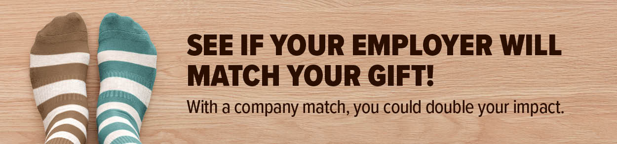 An email banner features a pair of feet wearing mismatched striped socks--one brown, one teal--and the words, "See if your employer will match your gift!"