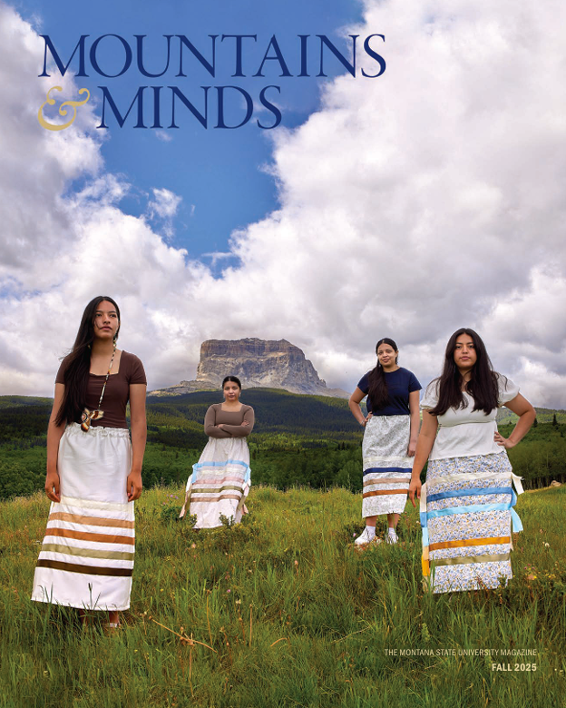 The cover for the Fall 2025 issue of Mountains & Minds features a photo of four women standing in a green field. In the distance is a lone mountain on the horizon.