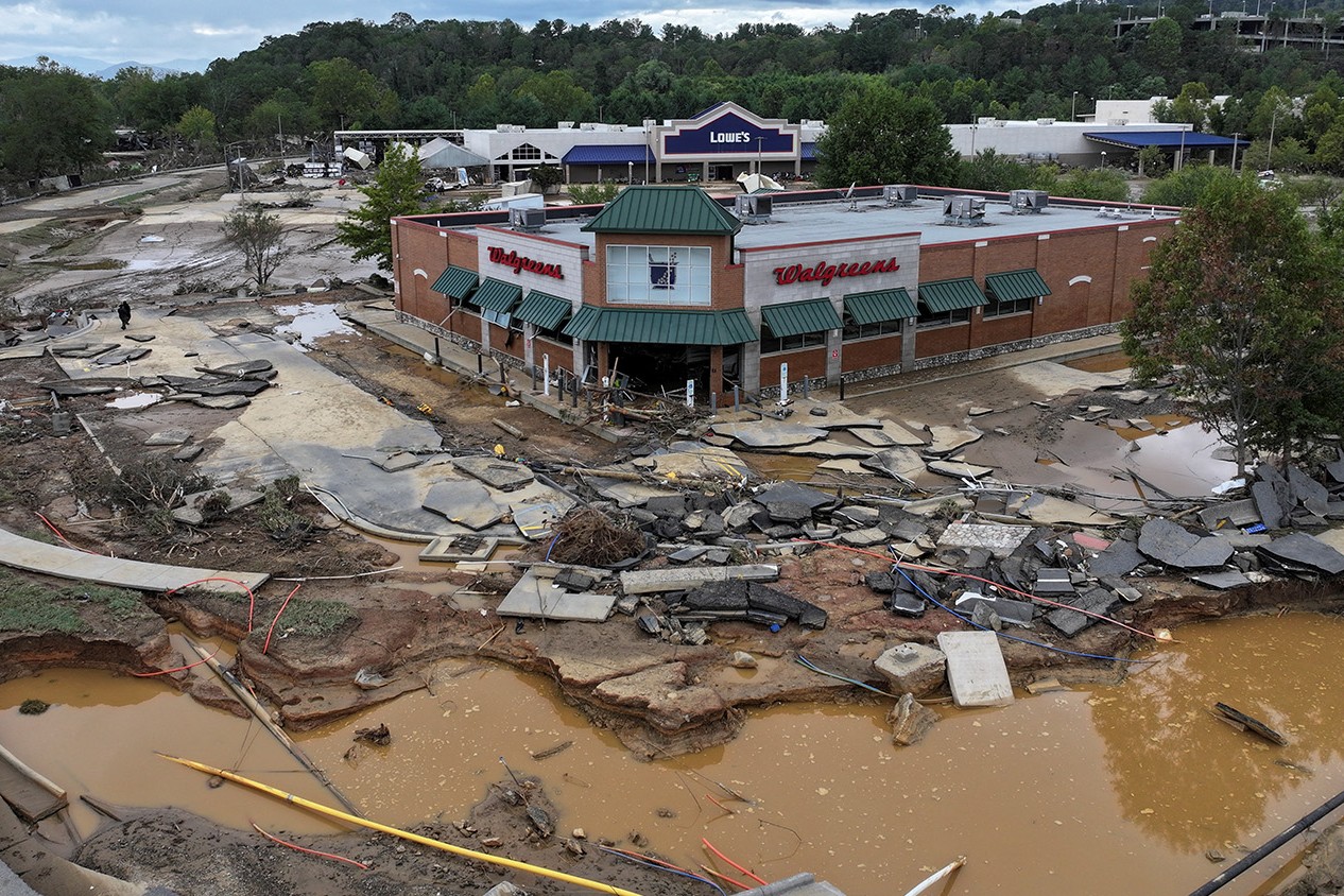 Photo of a Walgreens parking lot in Asheville, North Carolina after Topical Storm Helene.