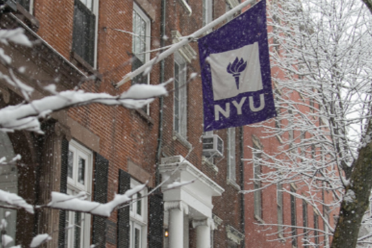 An external shot of the NYU campus in winter.