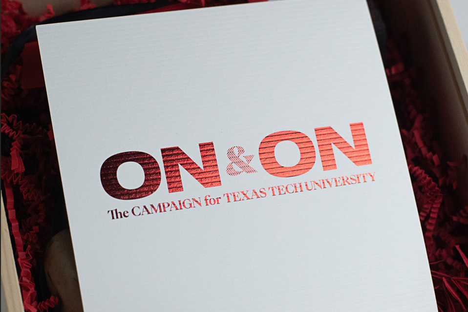 A piece of paper with "ON&ON: The Campaign for Texas Tech University" embossed in red.