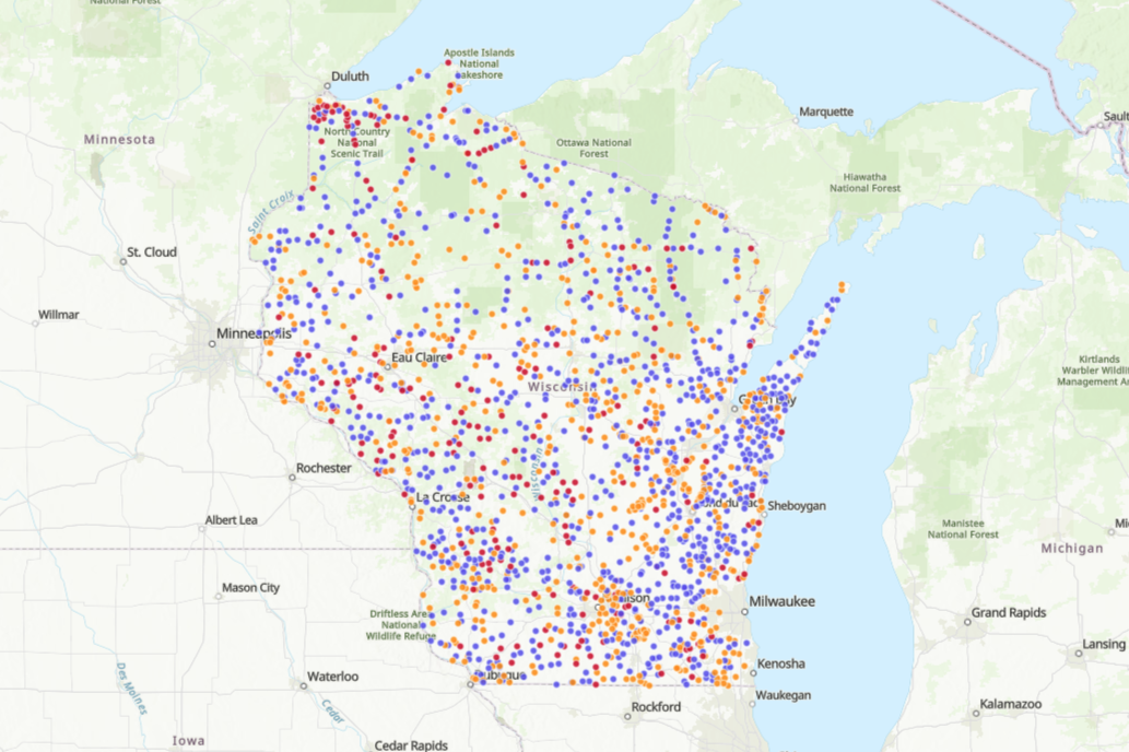 A map of Wisconsin shows purple (unincorporated communities), red (cartographic phantoms), and orange (unverified locales) dots.