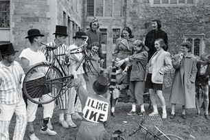 A group of costumed Yale students greet Vassar students after their bicycle ride to the college in 1952.