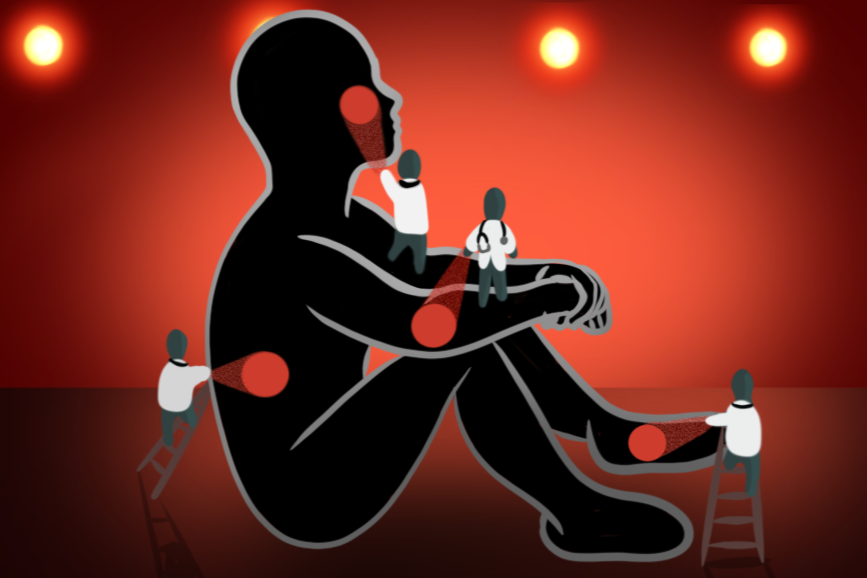 An illustration of a body-like shape being treated with red light by miniature doctors in lab coats.