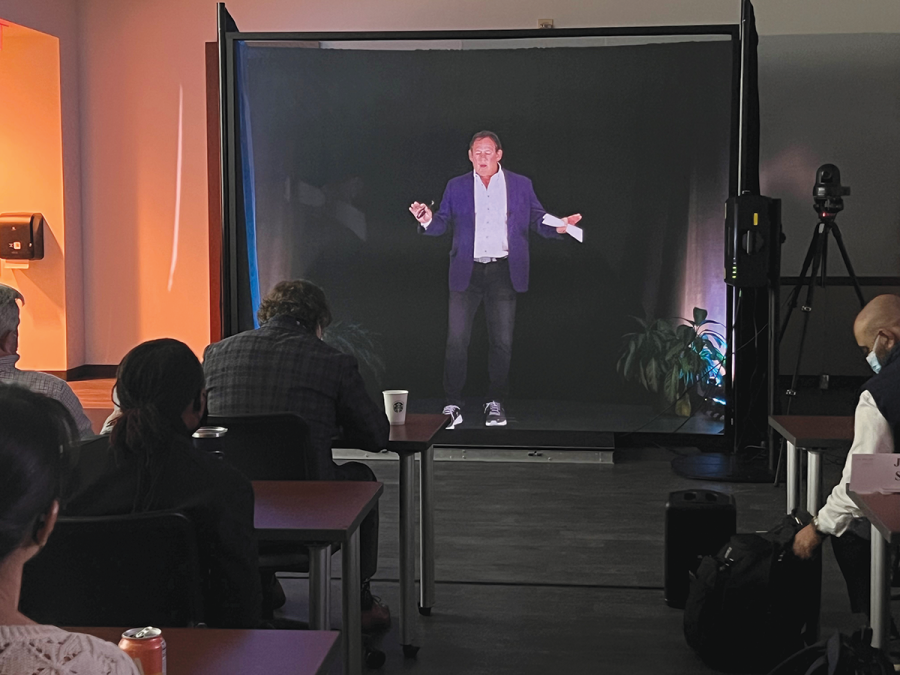 Rick Rieder appearing as a hologram at Emory University