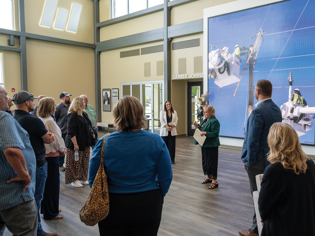 Shelly Mondeik leads a tour of the Wayne H. Bushman Advanced Manufacturing, Engineering Technology, and Apprenticeship Center
