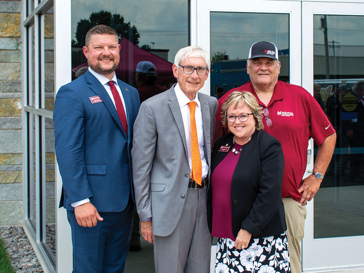 Mid-State Dean of the School of Applied Technology Ryan Kawski, Wisconsin Governor Tony Evers, Shelly Mondeik, and Mid-State donor Wayne Bushman