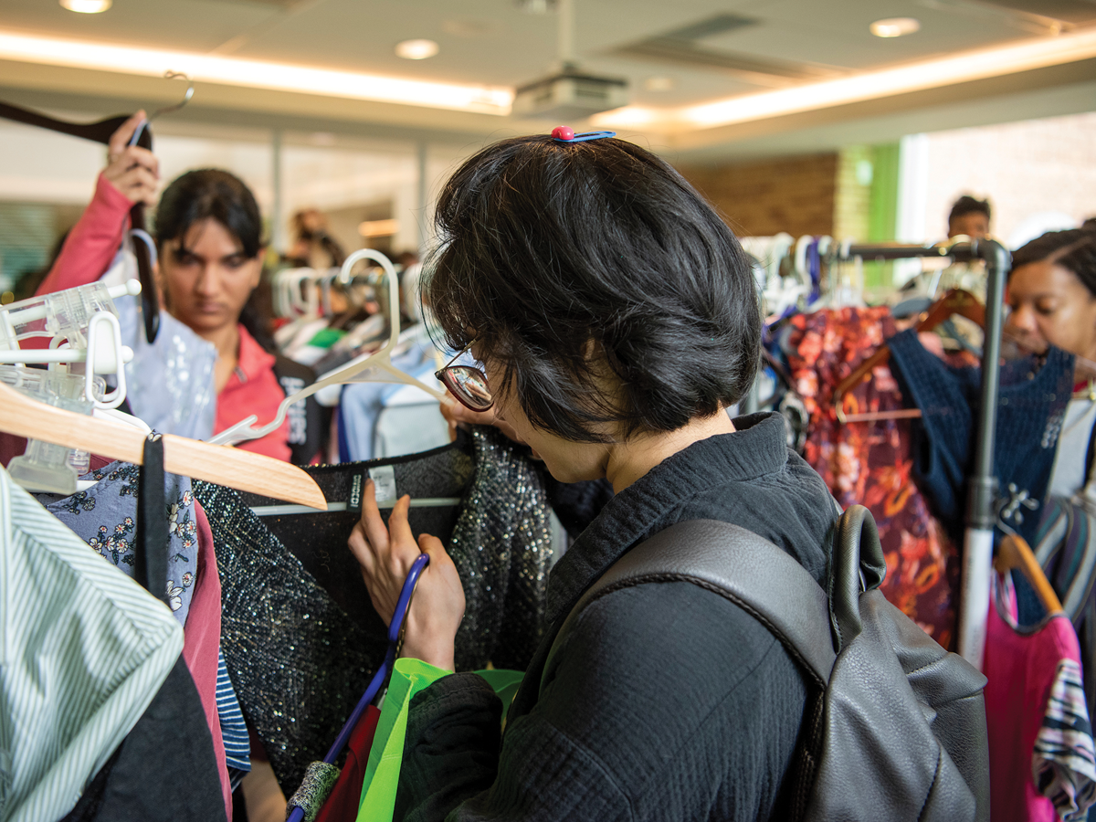 Students looking at clothes