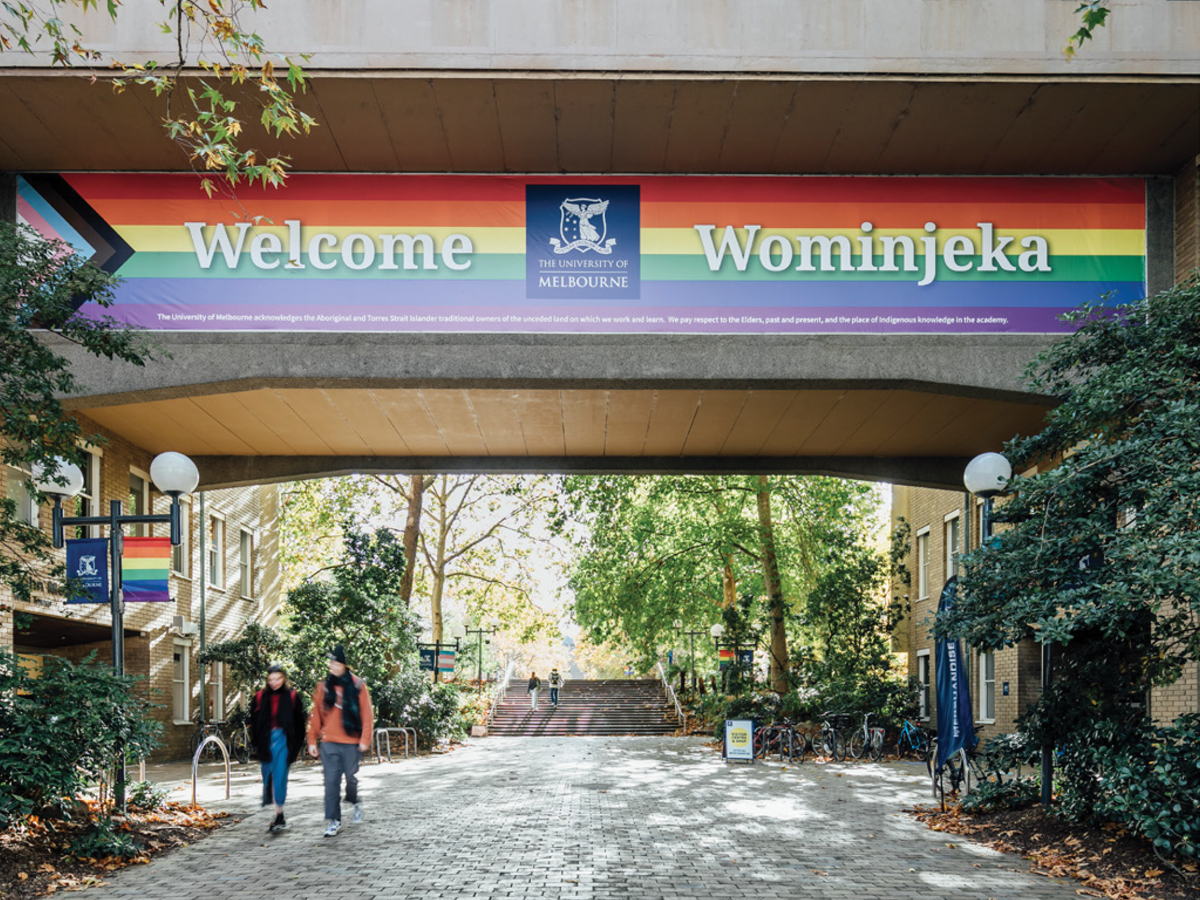 Pride rainbow and transgender flag on building at University of Melbourne campus
