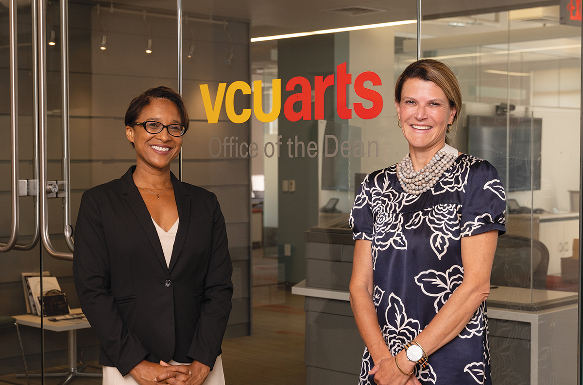 Carmenita Higgingbotham and Laura Kottkamp standing in front of the VCU Arts Office of the Dean