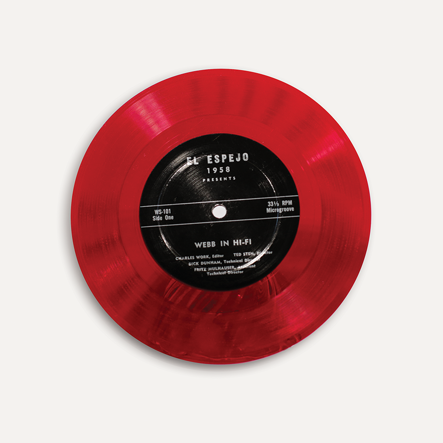 Photo of a red vinyl record from The Webb Schools