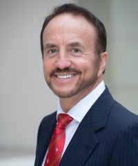Headshot of John McCall MacBain