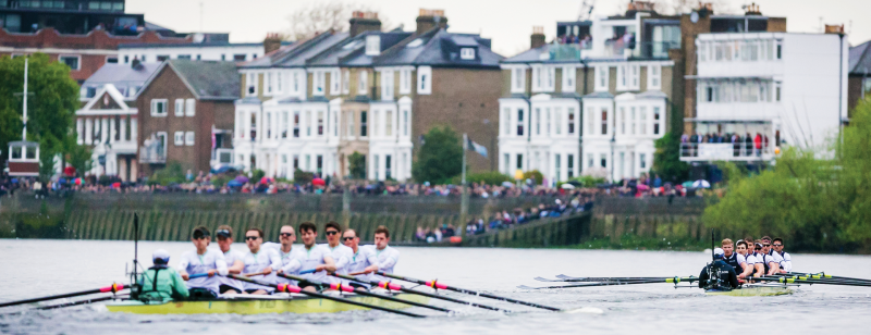 Cambridge and Oxford teams racing on the Thames