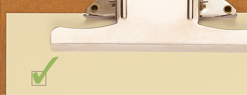 clipboard with green check in a box