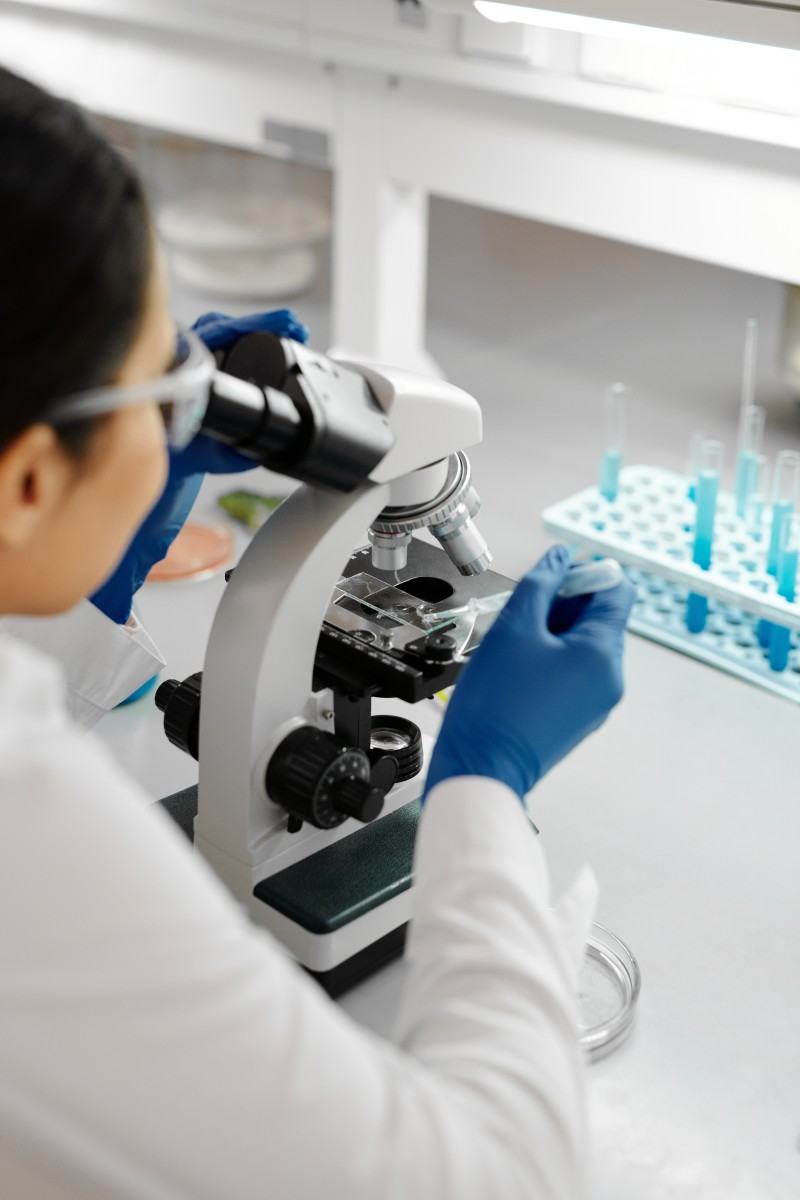 Person using a microscope