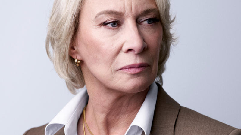 Headshot of Barbara Butcher, a white woman with short blonde hair.
