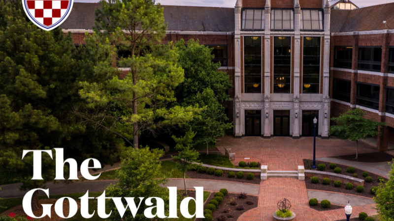 The cover of The Gottwald Impact Book features a photo of the University of Richmond campus.
