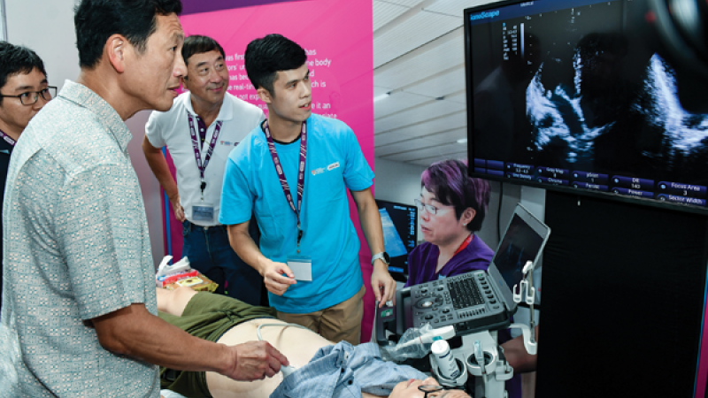 Students learning how to use a sonogram machine at the NTU Singapore School of Medicine festival