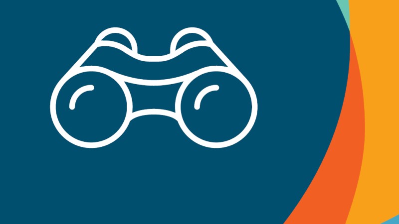 A logo with binoculars 