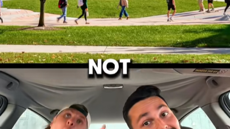 Screenshot from "Influencer Song: Bowling Green State University." The top half of the screen shows a photo of the Bowling Green State University campus. The bottom half of the screen shows Austin and Colin sitting in the front seats of a car rapping.