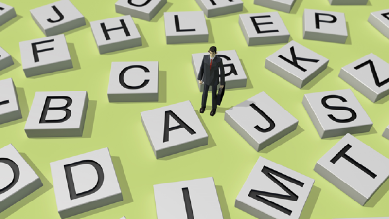 Man walking through a collection of letter tiles