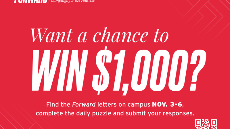 A sign promoting the University of Maryland's Forward Campaign. It reads, "Want a chance to win $1,000?"