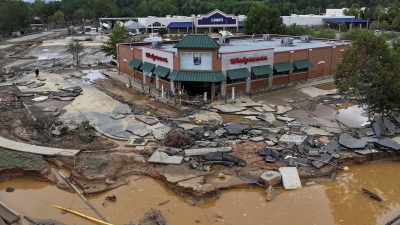 Photo of a Walgreens parking lot in Asheville, North Carolina after Topical Storm Helene.
