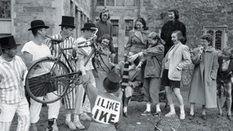 A group of costumed Yale students greet Vassar students after their bicycle ride to the college in 1952.