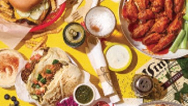 Iowa Magazine food edition cover displaying a table full of food. 
