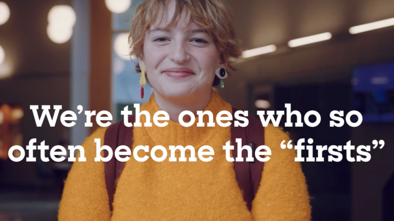 The words "We're the ones who so often become the 'firsts'" overlay a photo of a Wellesley College student in a yellow sweater smiling for camera.